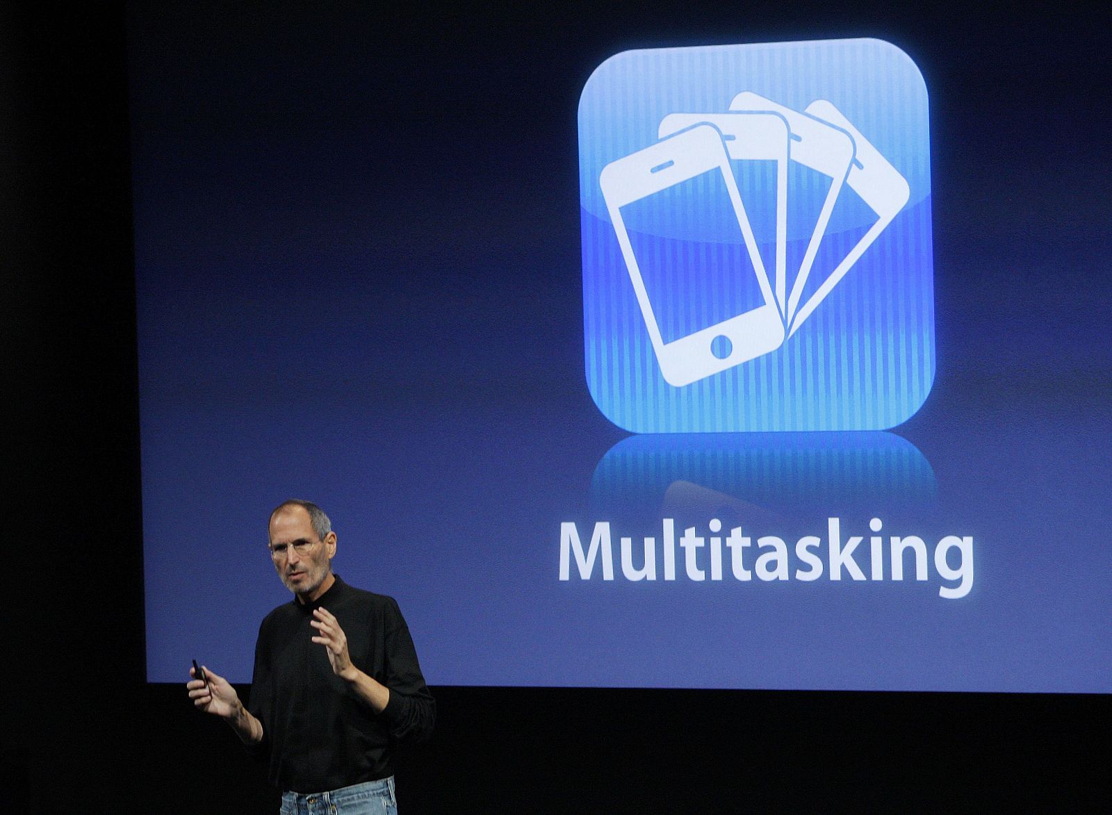 Apple Inc. CEO Steve Jobs speaks about the multitasking capabilities of the iPhone OS4 at a special event at Apple headquarters in Cupertino