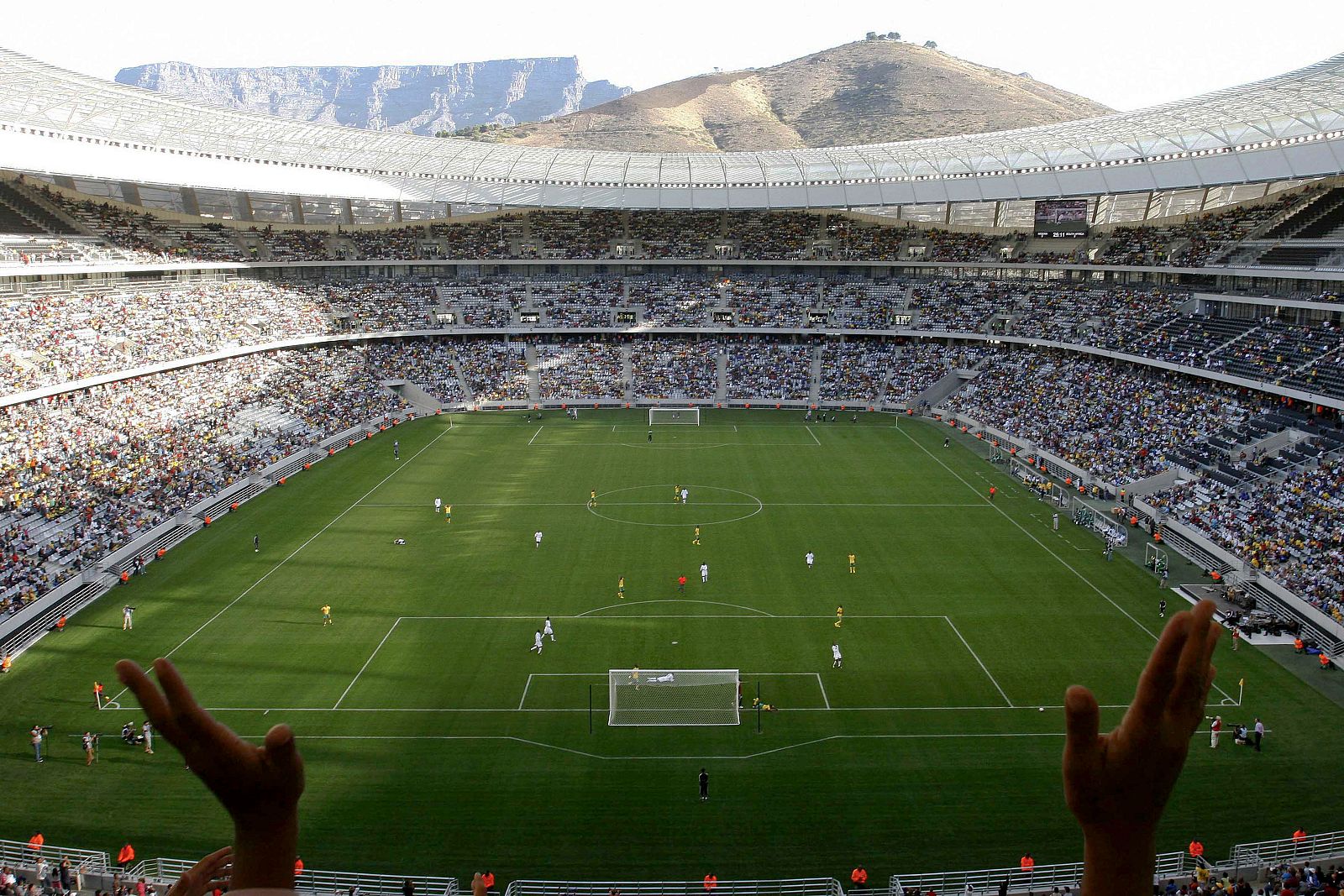 South African soccer fans cheer their team during their Under20 game against Nigeria