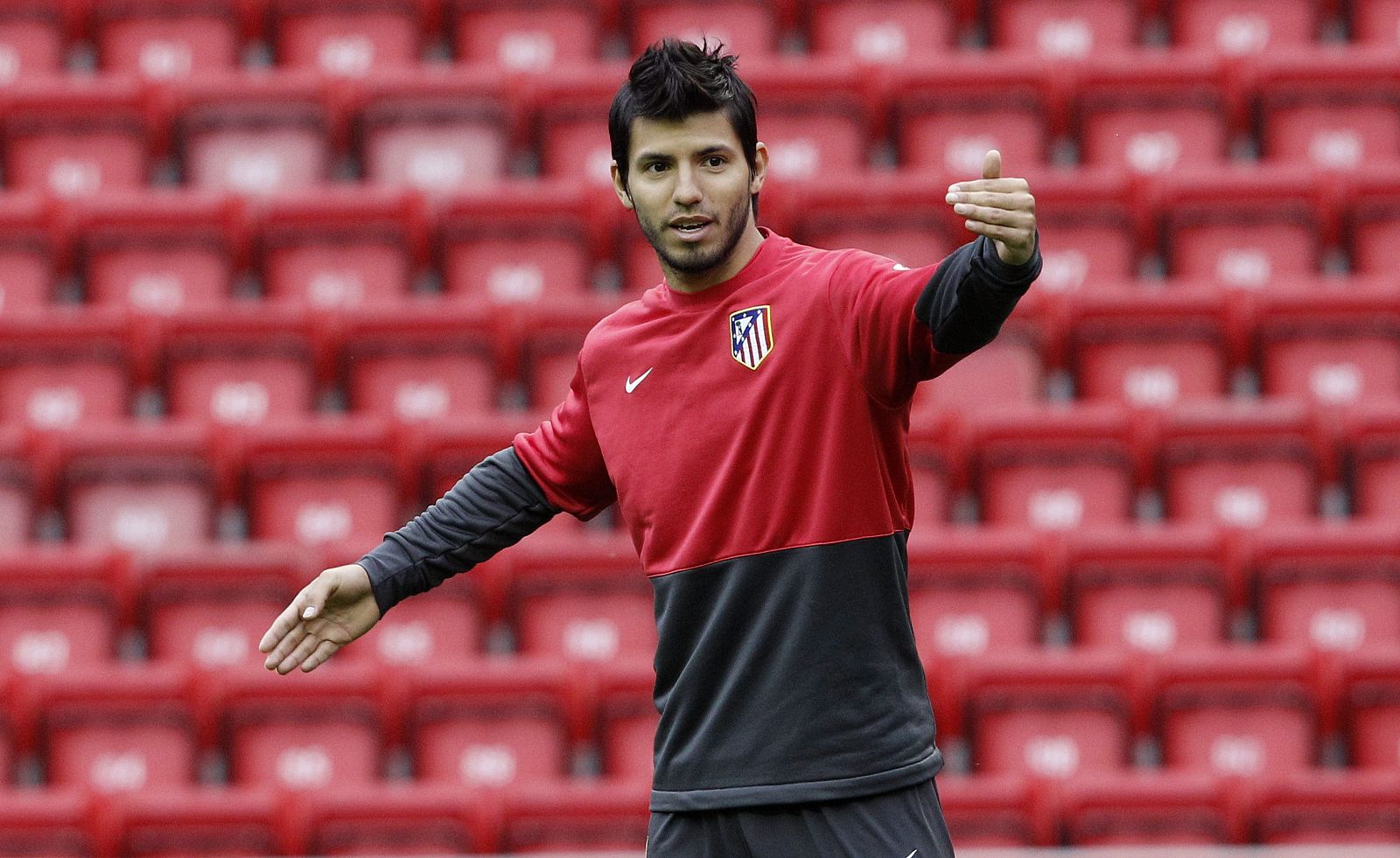 Atletico Madrid's Aguero gestures during a training session at Liverpool's Anfield stadium