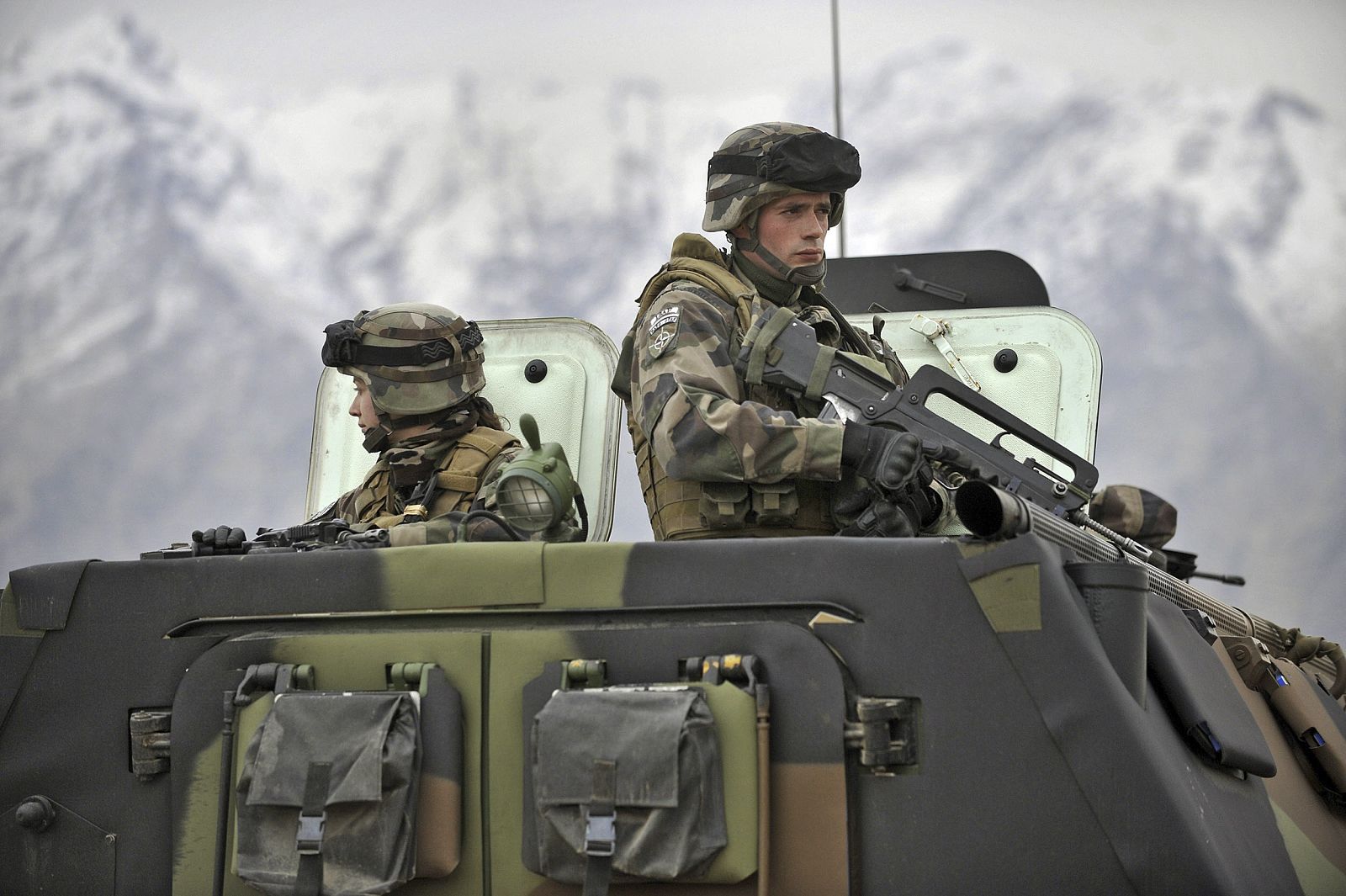 French soldiers patrol the mountains of the valley of Kapica during a visit by French Prime Minister Francois Fillon in Tagab