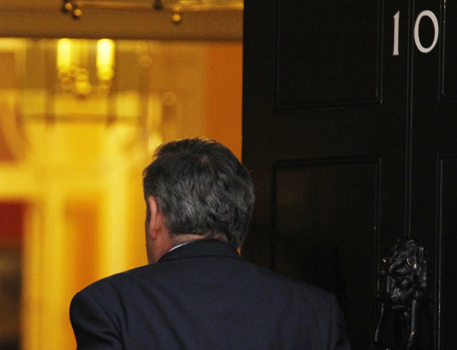 Britain's Prime Minister Brown arrives in Downing Street, in central London