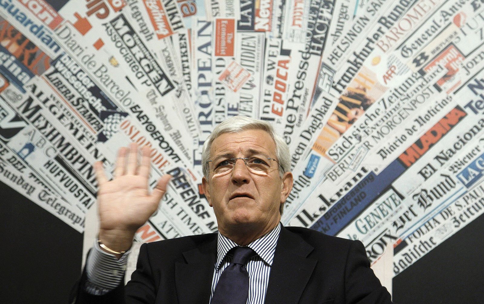 Italy's national soccer coach Lippi gestures during a news conference in Rome