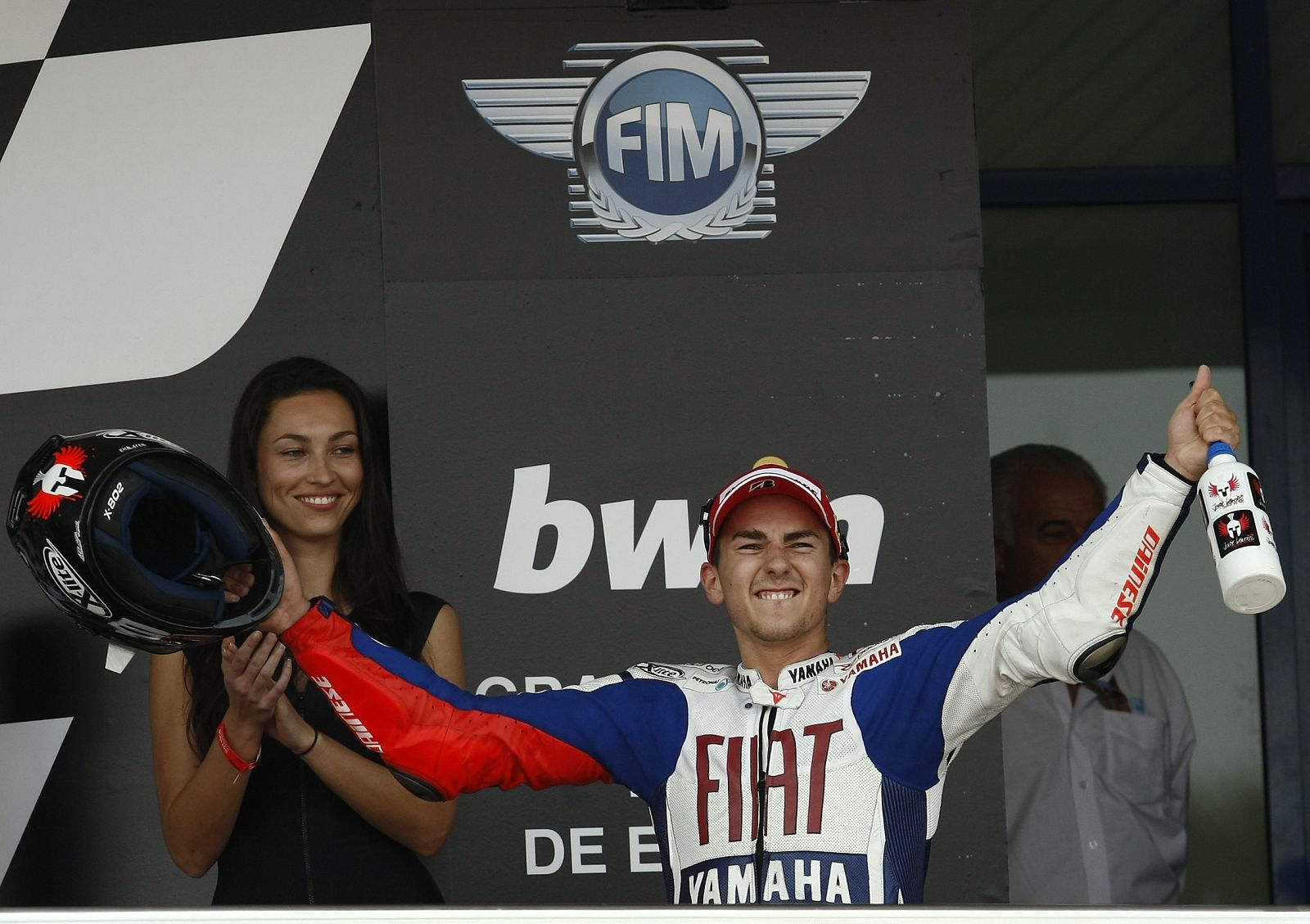 Yamaha MotoGP rider Lorenzo of Spain celebrates on podium after winning the Spanish Grand Prix in Jerez