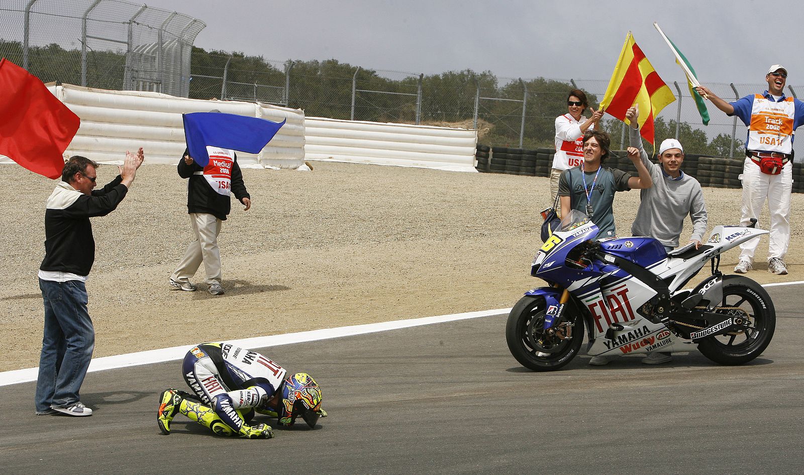 Yamaha MotoGP rider Rossi of Italy celebrates on the "corkscrew" turn after winning the 2008 U.S. Grand Prix at Laguna Seca raceway near Monterey