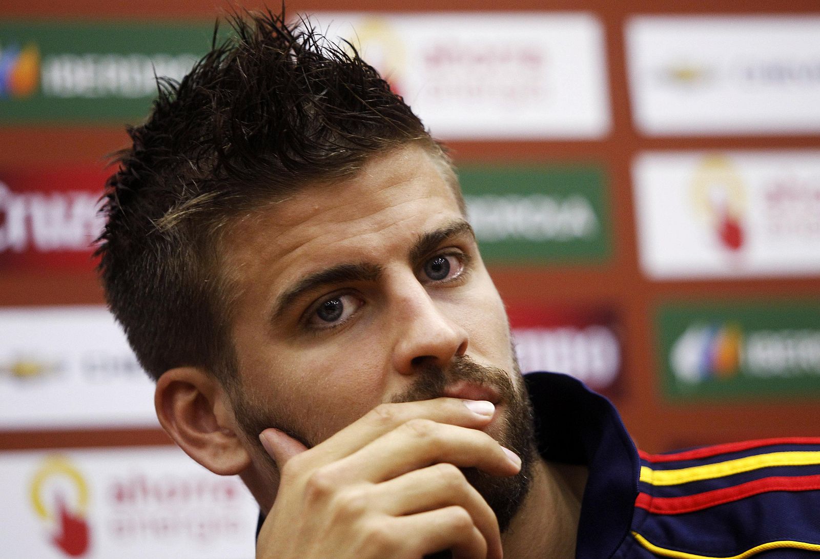 Spain's national soccer team player Pique attends a news conference at the Spanish Soccer Federation headquarters in Las Rozas, outside Madrid