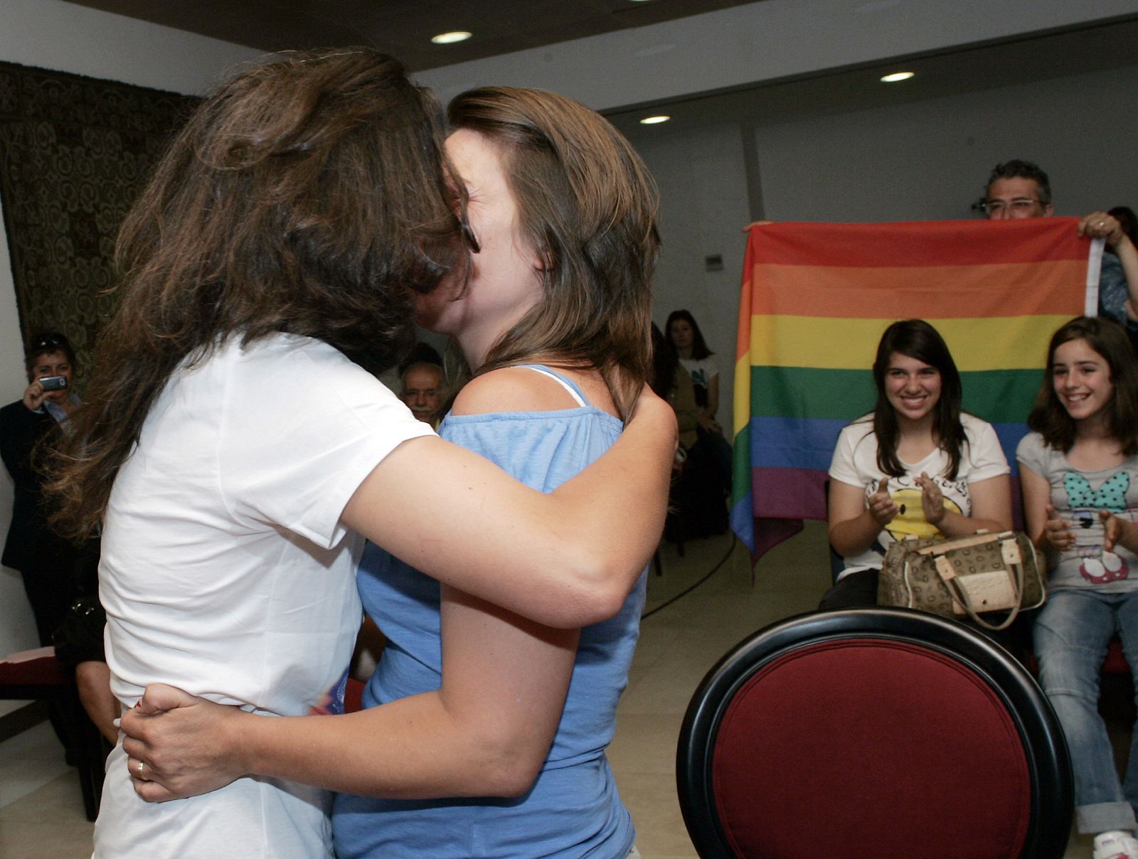 Teresa Paixao and her partner Helena Pires kiss as they get married at a government's registry office in Lisbon