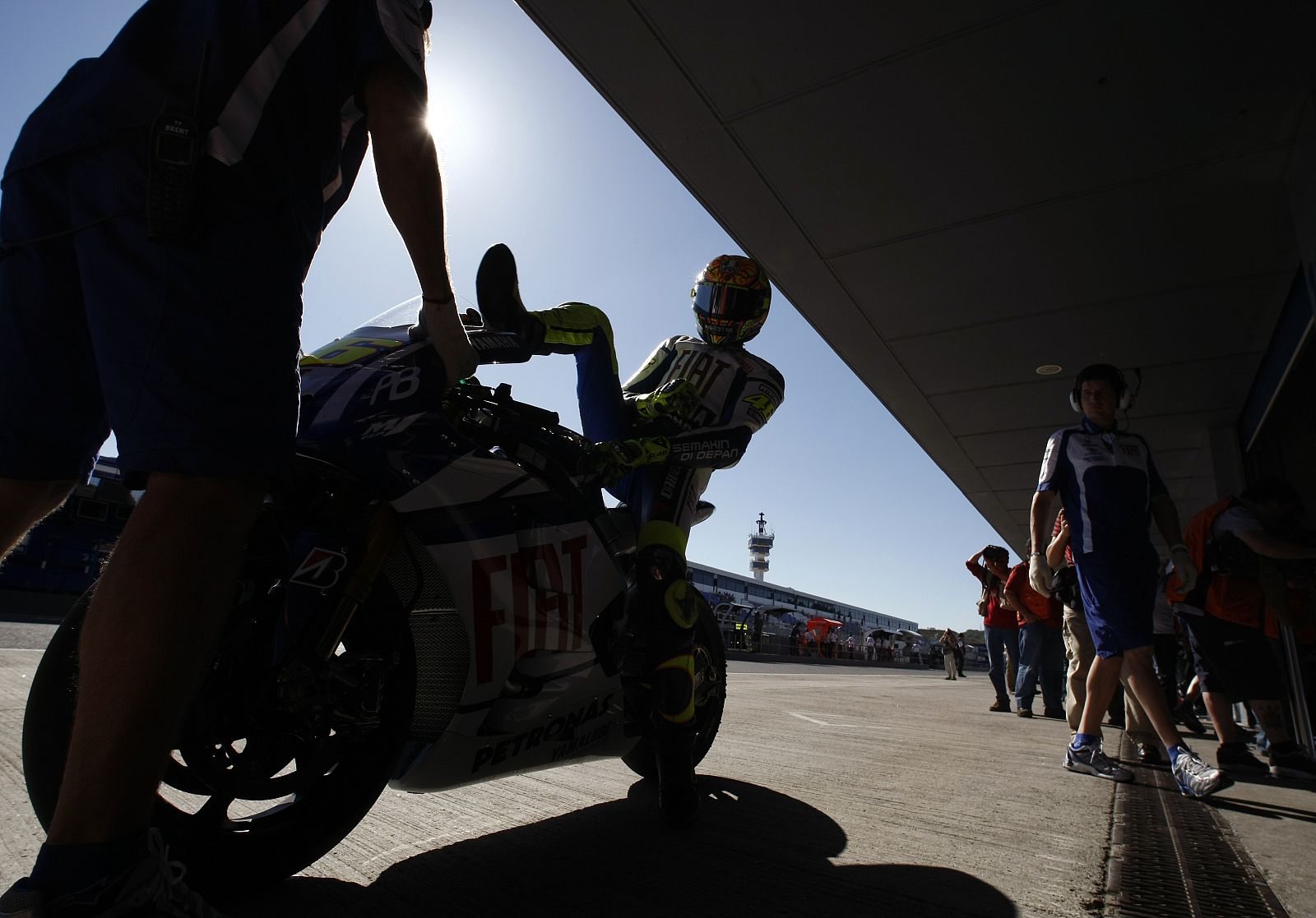 Yamaha MotoGP rider Rossi of Italy gets off from his bike during the Spanish Grand Prix in Jerez