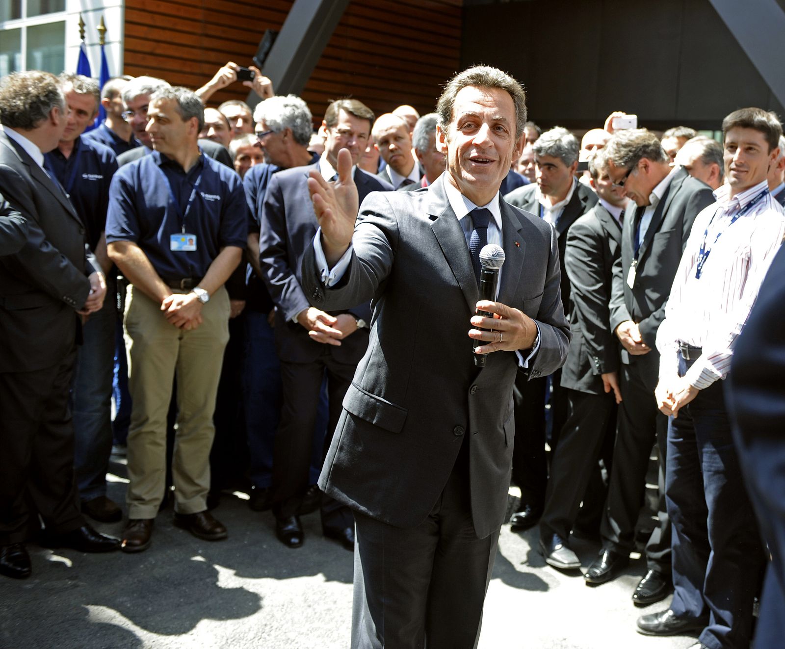 France's President Sarkozy addresses the employees of French helicopter maker Turbomeca site in Bordes