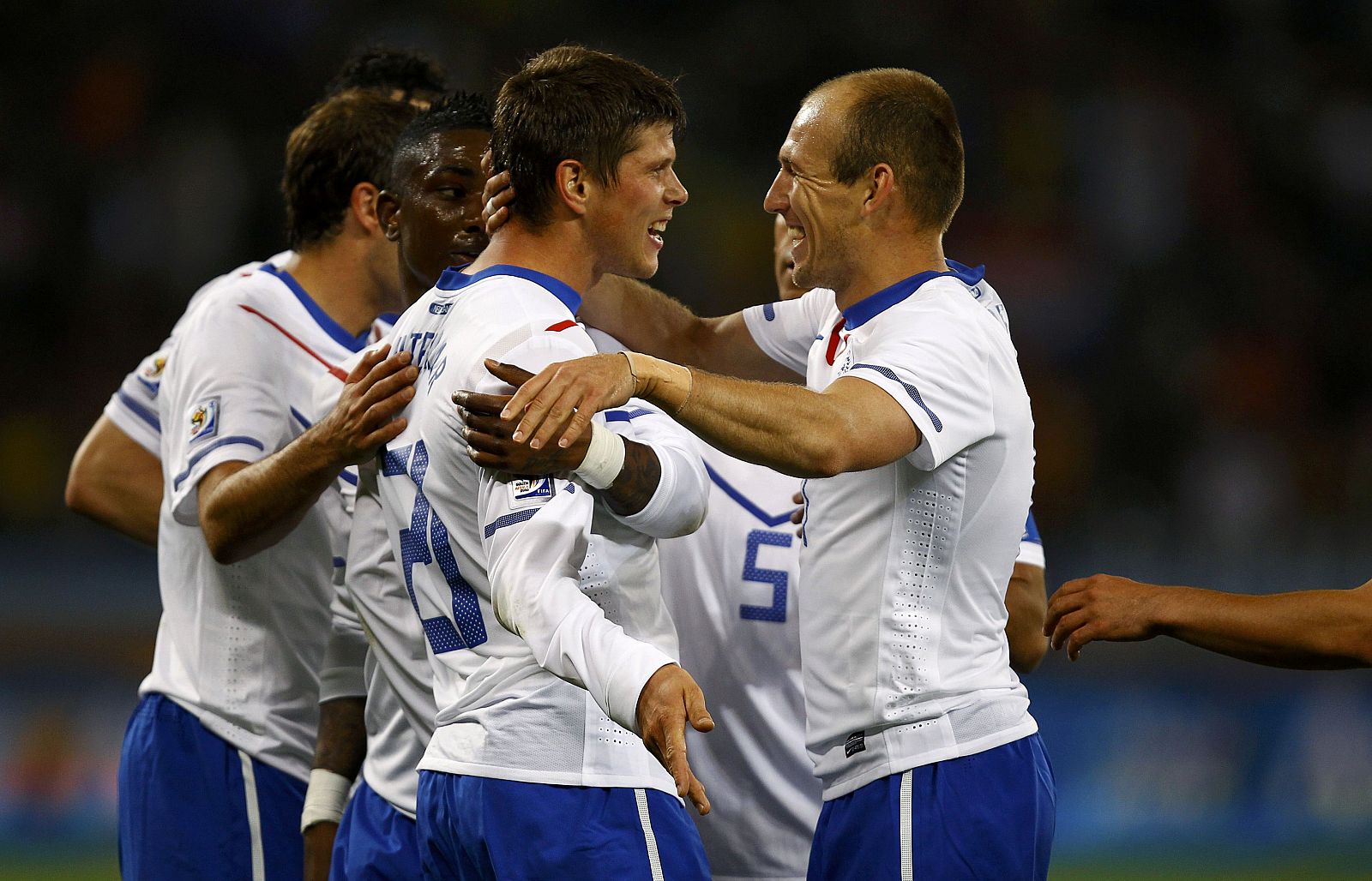 Netherlands' Huntelaar celebrates with team mate Robben after scoring against Cameroon during a World Cup soccer match at Green Point stadium in Cape Town