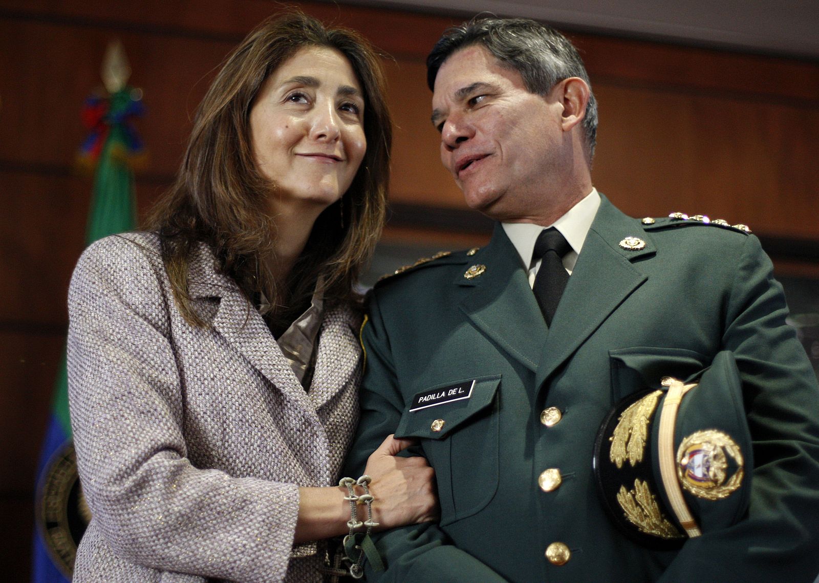 Former FARC hostage, French-Colombian Betancourt, talks with Commander of the Armed Forces General Padilla after a ceremony for the two-year anniversary of "Operation Jaque", at a military school in Bogota