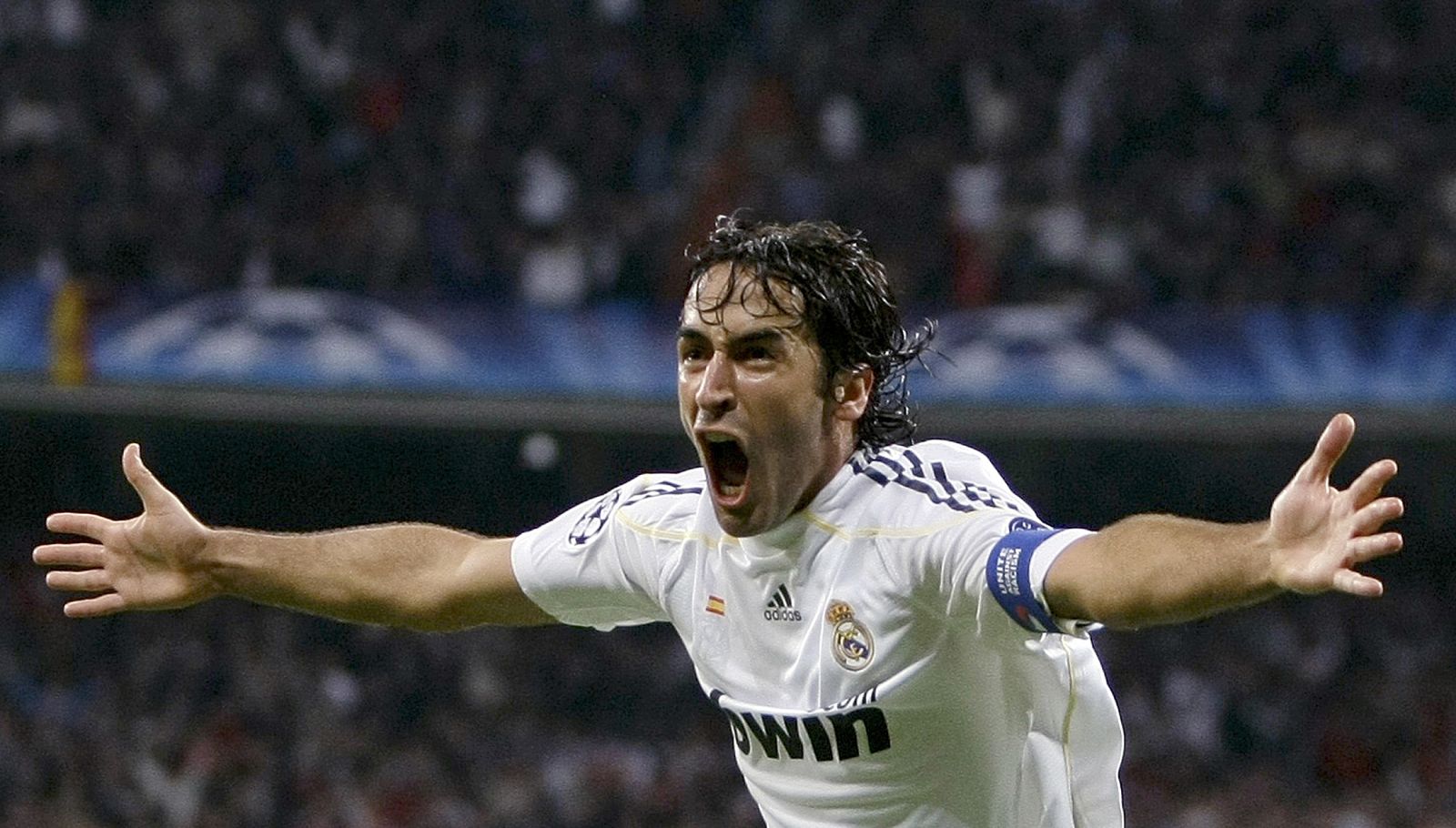 Real Madrid's Raul celebrates his goal against  AC Milan's goalkeeper Dida during their Champions League soccer match at the Santiago Bernabeu stadium in Madrid