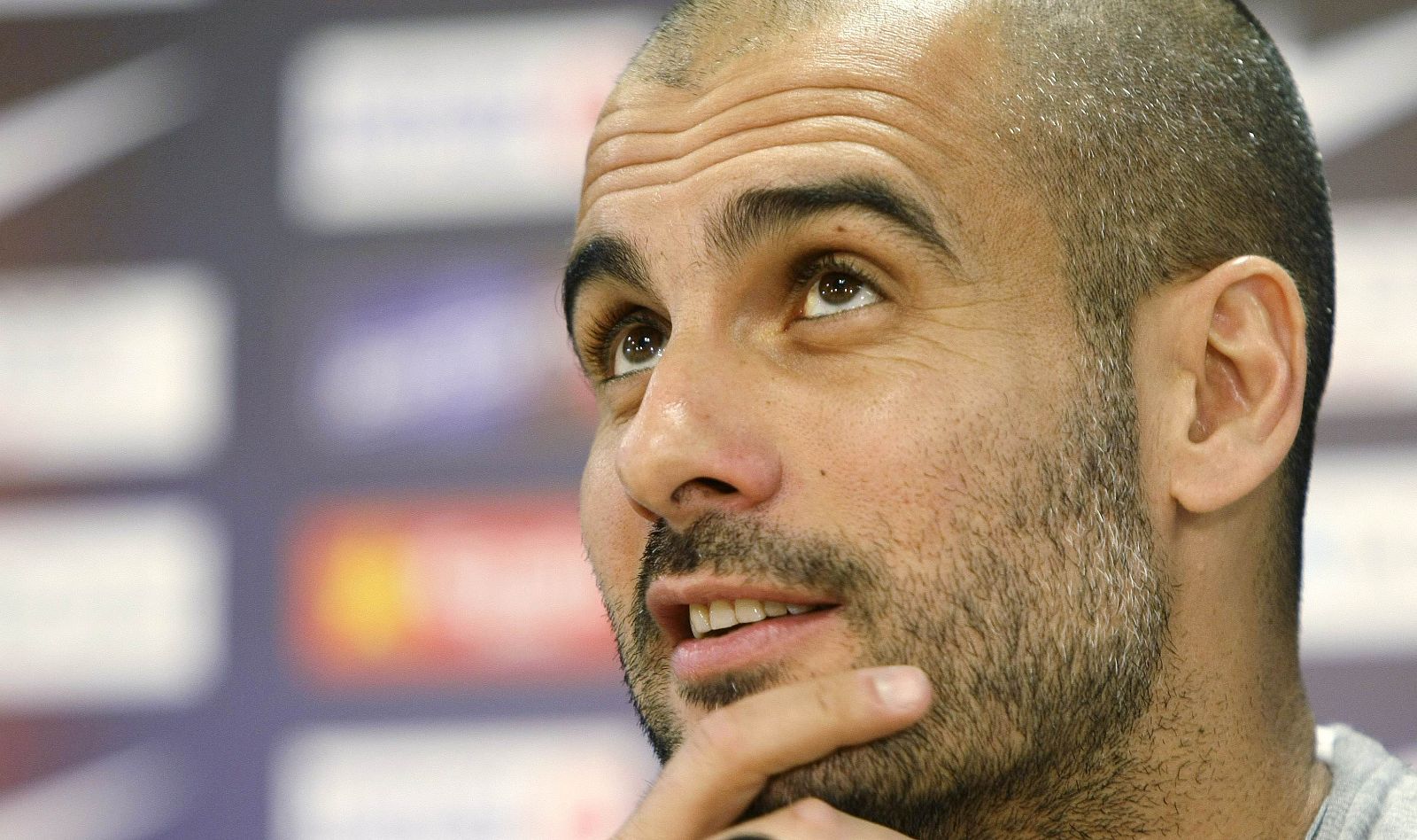 Barcelona's coach Pep Guardiola responds to a question during a news conference at the Ciutat Esportiva Joan Gamper in Barcelona