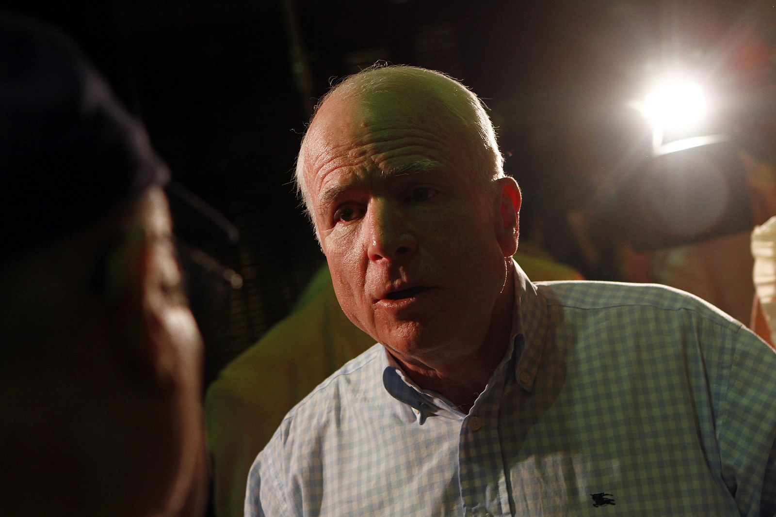 U.S. Senator John McCain greets supporters during a campaign stop at his headquarters in Phoenix