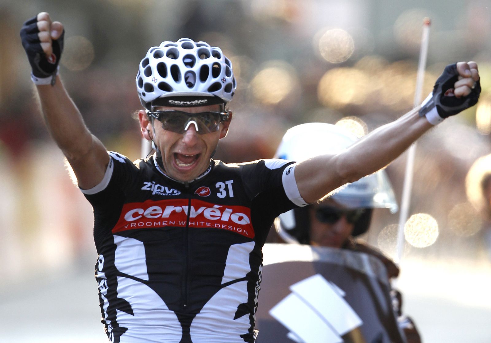 Cervelo team rider Tondo celebrates winning the sixth stage of the Paris-Nice cycling race