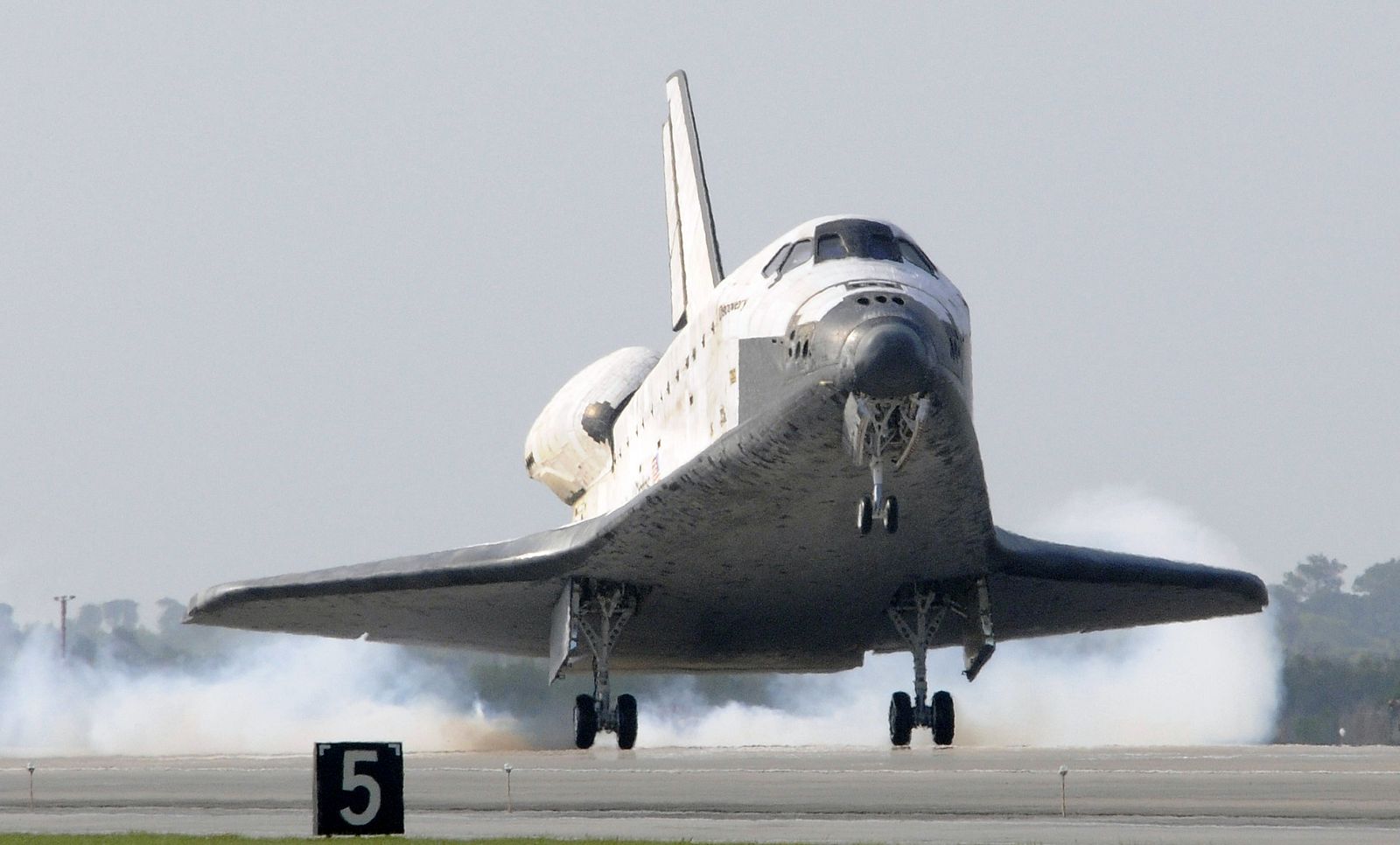 The Space Shuttle Discovery lands at the Kennedy Space Center in Cape Canaveral
