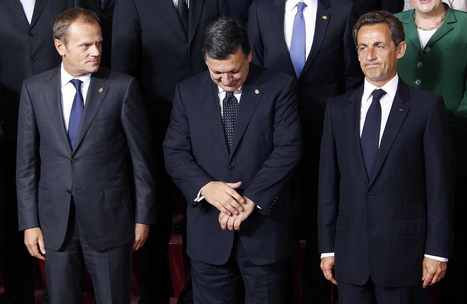 Poland's Prime Minister Tusk, EU Commission President Barroso and France's President Sarkozy pose for a family photo during an EU leaders summit in Brussels