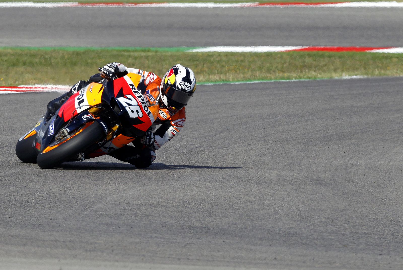 Honda MotoGP Dani Pedrosa of Spain takes a curve during the second free practice session of the San Marino motorcycling Grand Prix at the Misano circuit