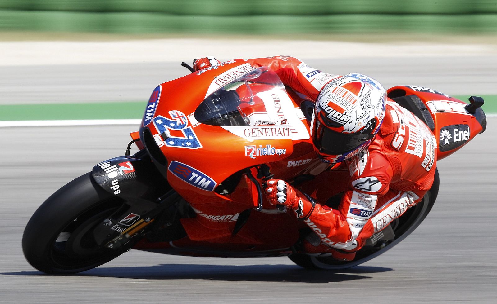 Ducati MotoGP rider Stoner of Australia takes a curve during the qualifying session of the San Marino motorcycling Grand Prix at the Misano circuit