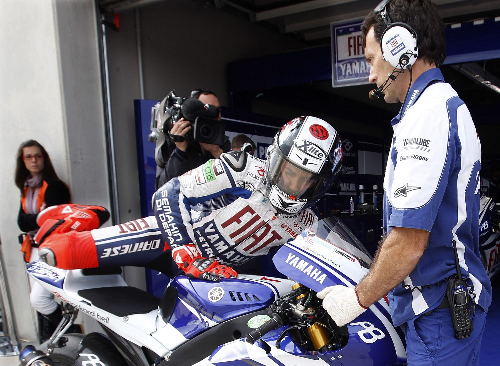 Yamaha MotoGP rider Jorge Lorenzo of Spain gets off his bike during free practice session of the Aragon Grand Prix at Motorland race track in Alcaniz