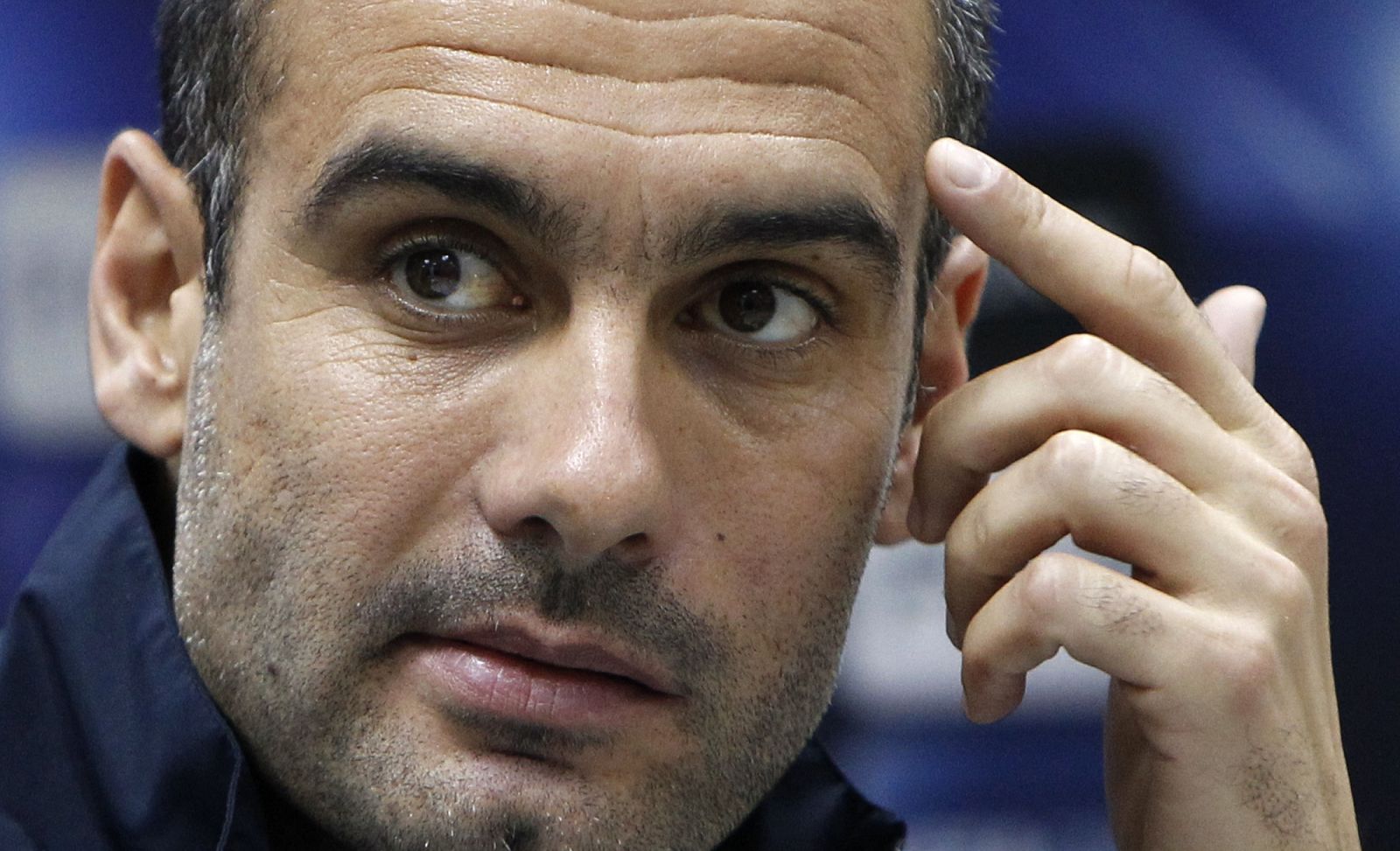 Barcelona's coach Guardiola attends a news conference in Kazan