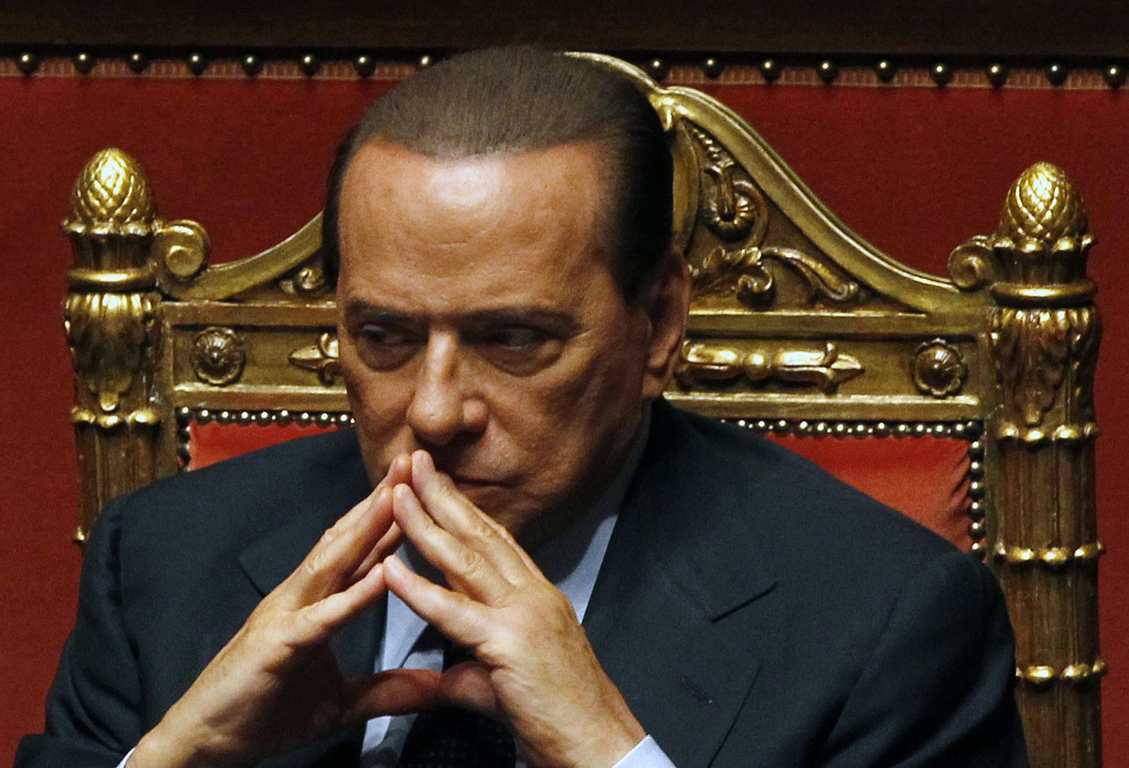 Italy's Prime Minister Berlusconi looks on during a debate in the Senate in Rome