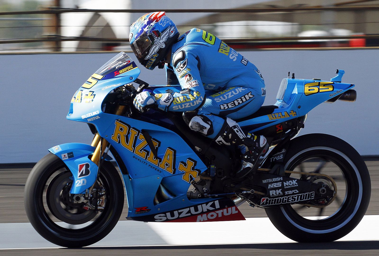 Suzuki rider Loris Capirossi rides during practice at the Indianapolis Motor Speedway