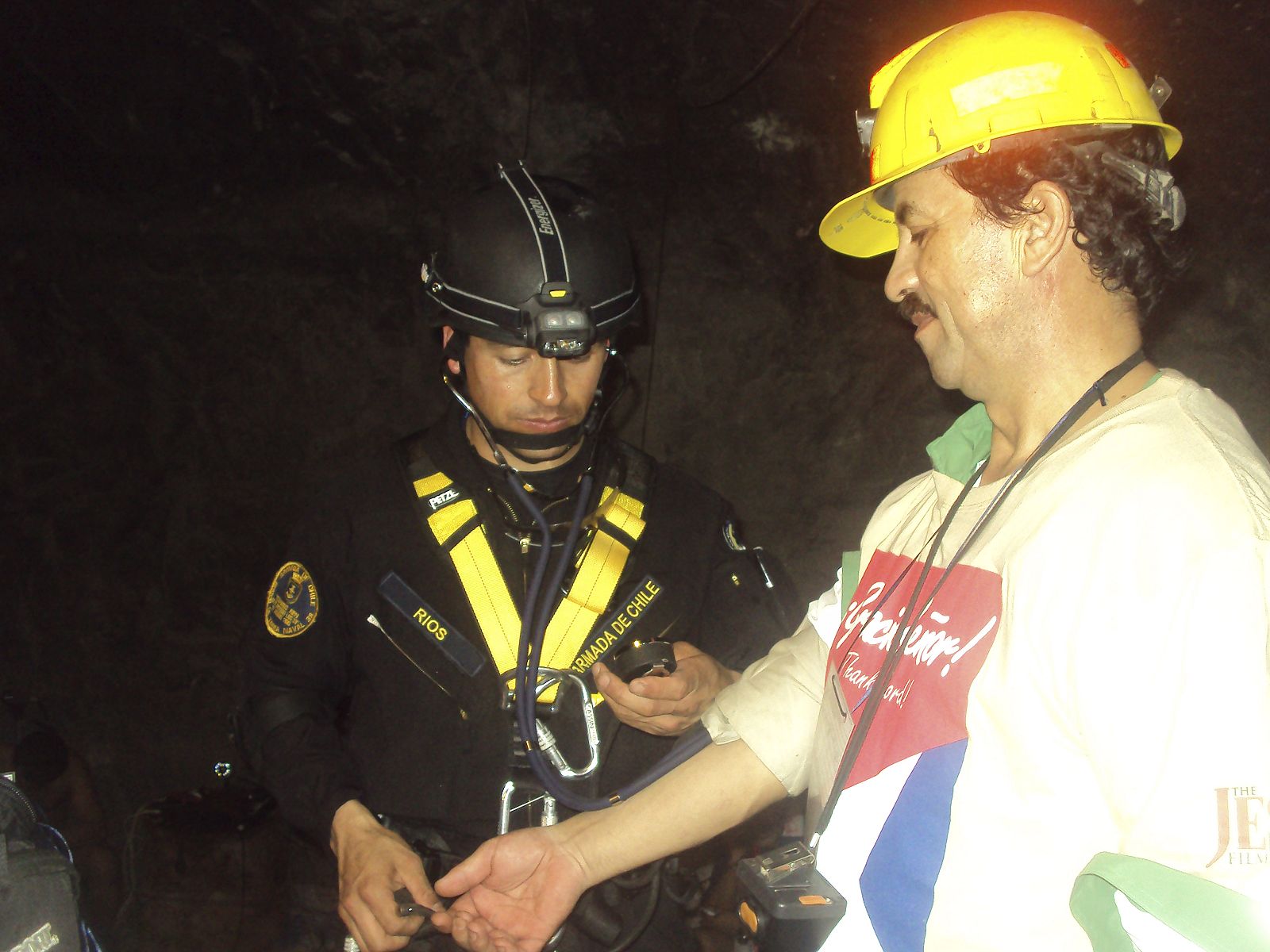 Chilean trapped miner Juan Illanes receives a medical check before rescue operation from San Jose mine in Copiapo