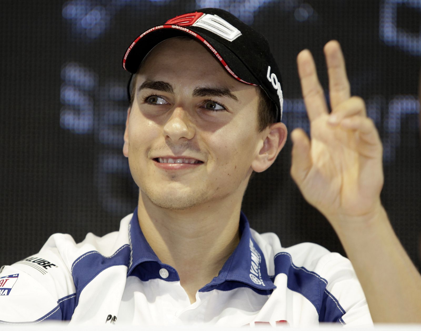 Yamaha MotoGP rider Jorge Lorenzo of Spain waves during a meet-the-fans session ahead of this weekend's Malaysian Grand Prix, in Kuala Lumpur