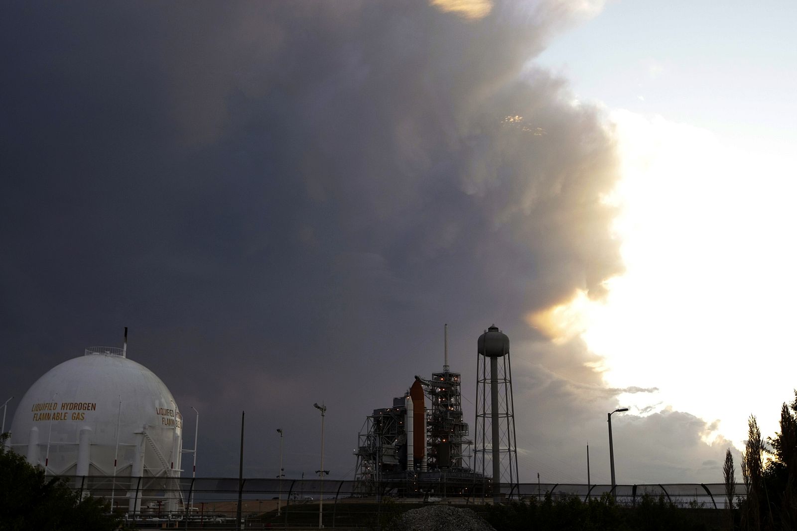 A large weather front is pictured moving over Space Shuttle Discovery at Kennedy Space Center in Cape Canaveral