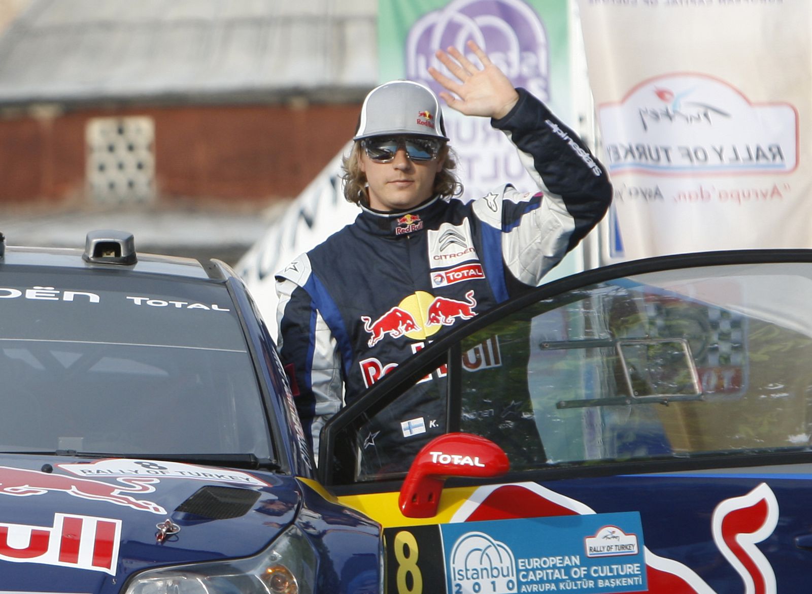 Citroen driver Raikkonen waves to spectators at the start line of the FIA WRC Rally of Turkey in Istanbul