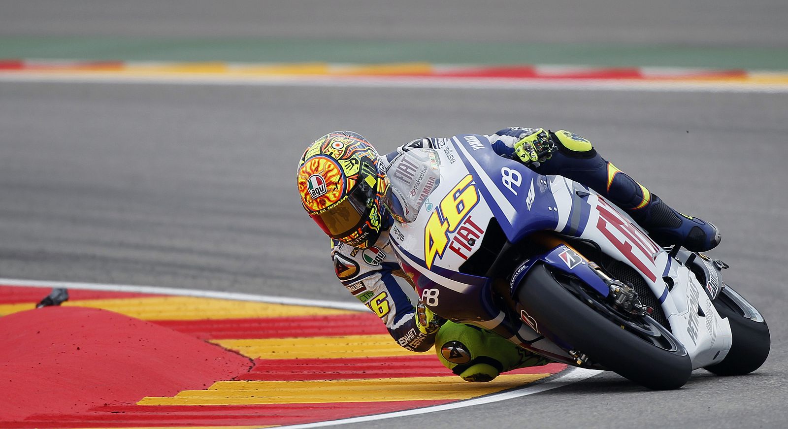 Yamaha MotoGP rider Valentino Rossi of Italy takes a curve during the third free practice of the Aragon Grand Prix at Motorland racetrack in Alcaniz