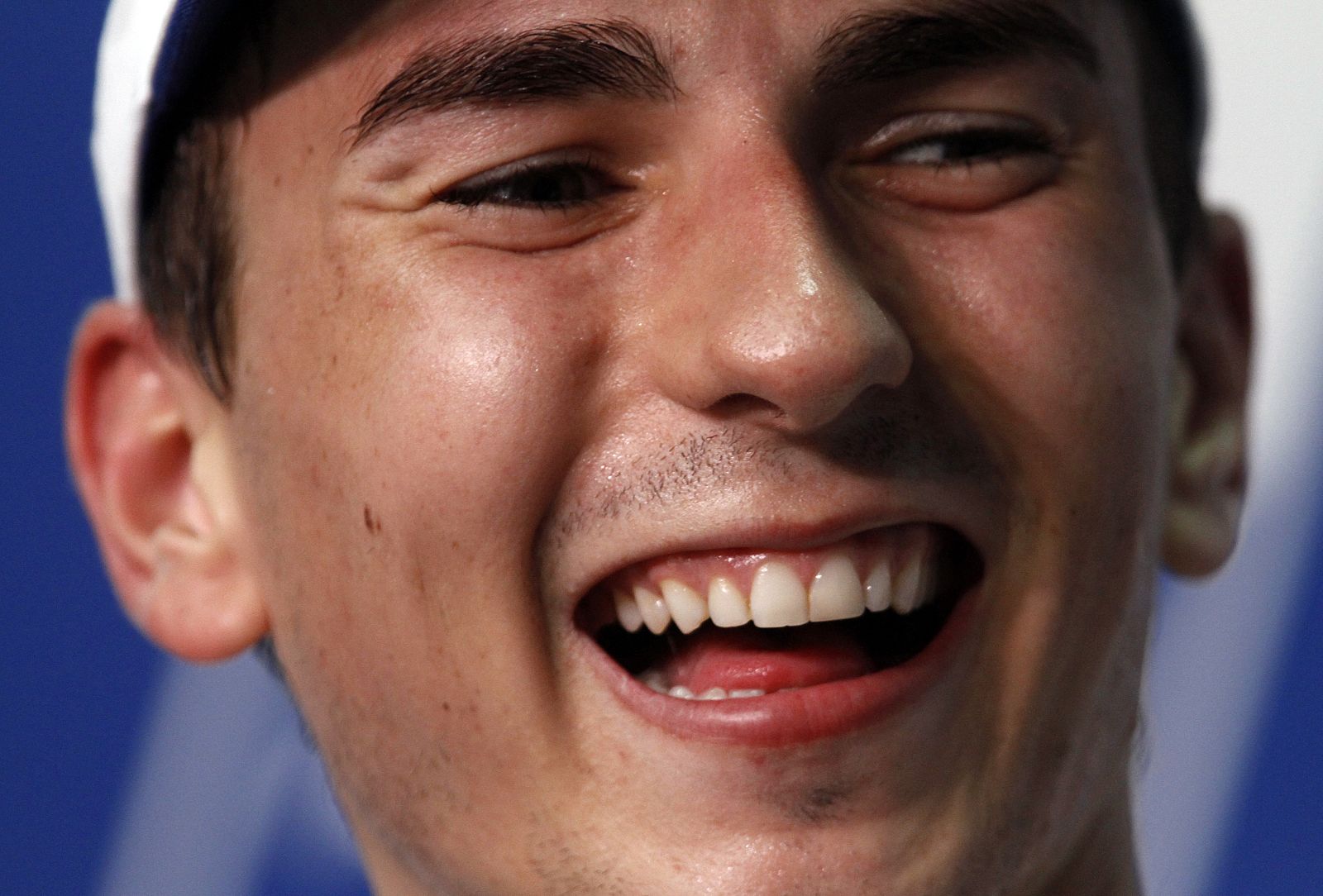 Yamaha MotoGP rider Lorenzo of Spain  smiles during news conference after Malaysian Grand Prix in Sepang