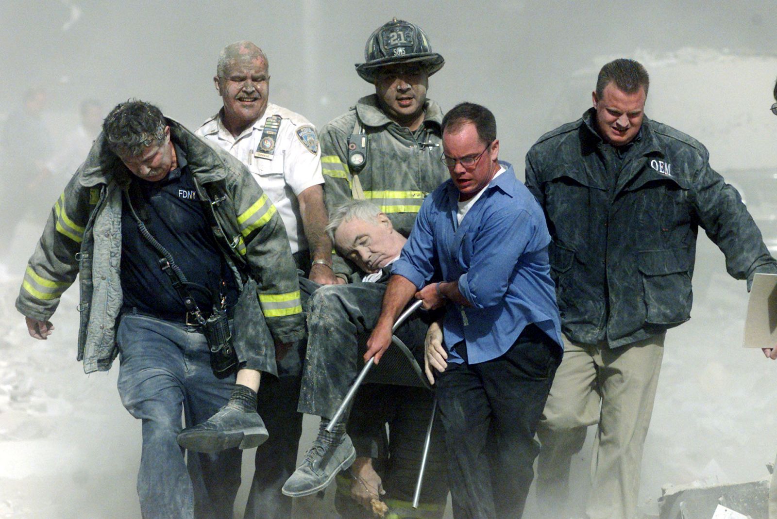 FIRE DEPARTMENT CHAPLAIN CARRIED FROM WORLD TRADE CENTER.