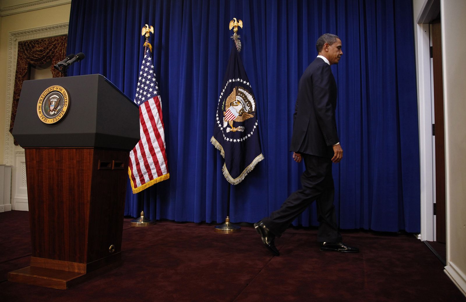 U.S. President Obama leaves the lecturn after speaking about jobs in Washington