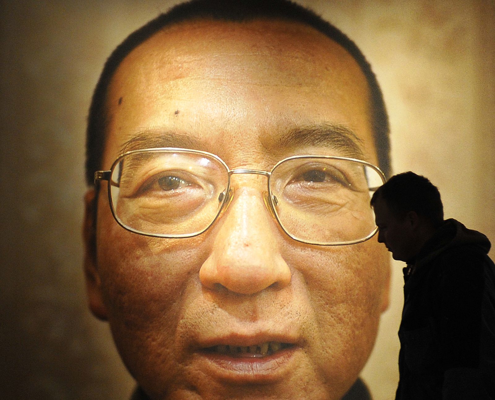 Workers prepare the Nobel Peace Prize laureate exhibition 'I Have No Enemies' for Chinese dissident Liu Xiaobo at the Nobel Peace Center in Oslo