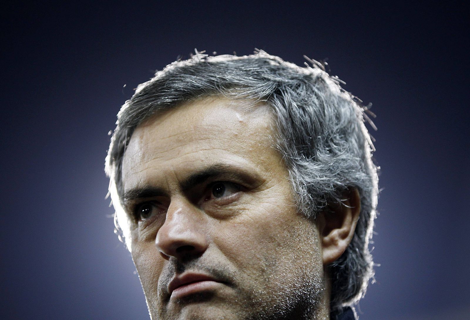 Portuguese coach Jose Mourinho waits for the start of the Champions for Africa friendly soccer match in Madrid