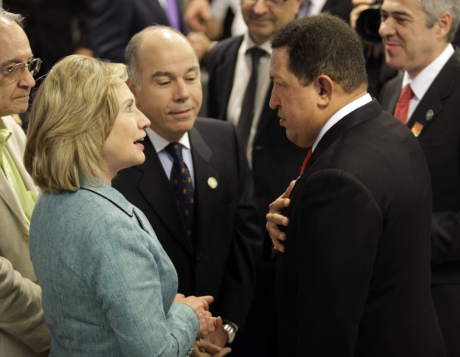 U.S. Secretary of State Hillary Clinton speaks with Venezuelan President Hugo Chavez in Brasilia