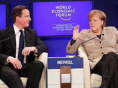 Merkel defiende el euro ante el Foro de Davos y rechaza la multiplicidad de sistemas financieros