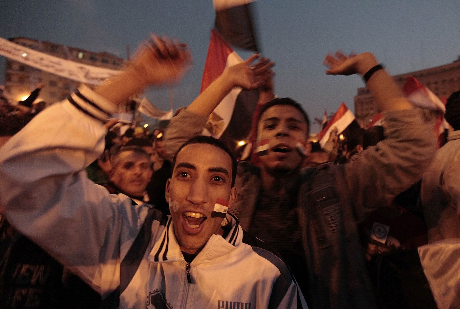 Anti-government protesters celebrate inside Tahrir Square after the announcement of Egyptian President Hosni Mubarak's resignation in Cairo