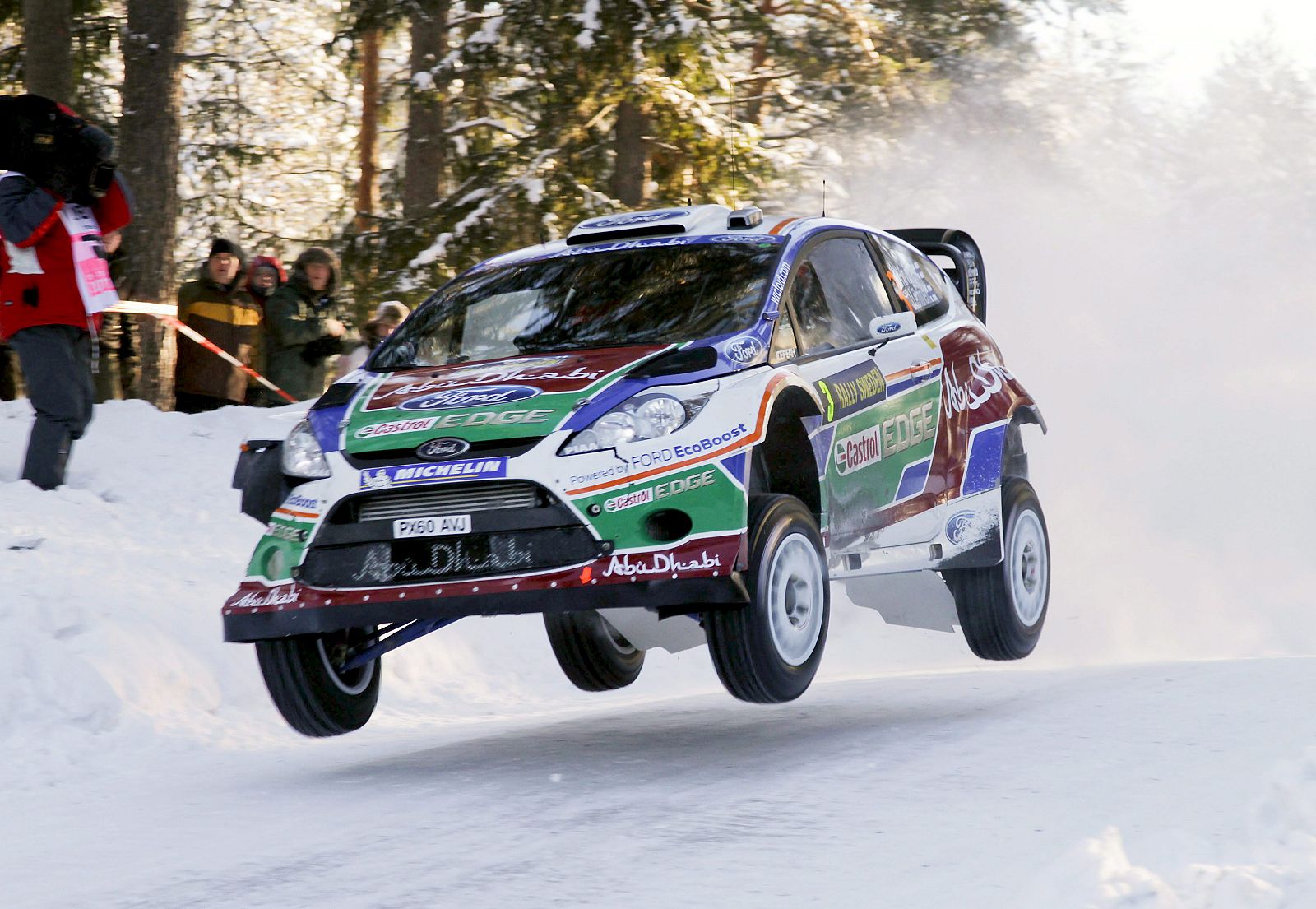 El piloto finés Mikko Hirvonen y su copiloto Jarmo Lehtinen ganadores en el rally de Suecia.