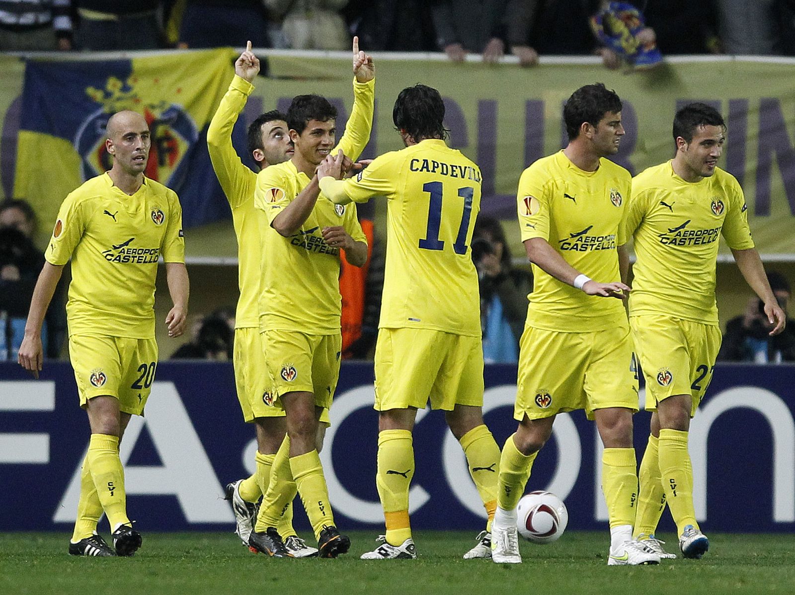 Villarreal's players celebrate after they scored a goal against Napoli during their Europa League soccer match in Villarreal