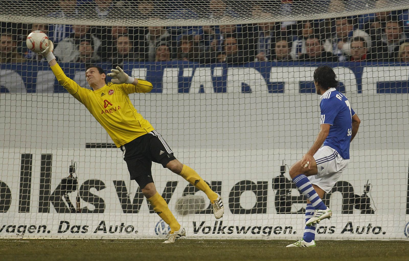 Schalke 04's Raul tries to score against Nuremberg during the German Bundesliga soccer match in Gelsenkirchen