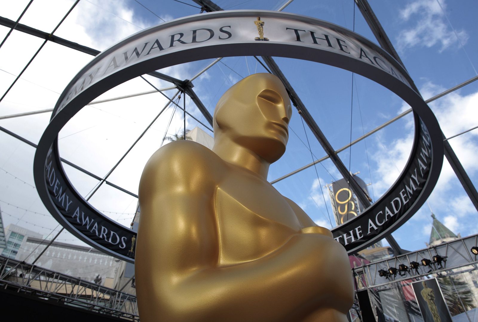 An Oscar statue is seen beneath plastic sheeting during preparations for the 83rd Academy Awards in Hollywood