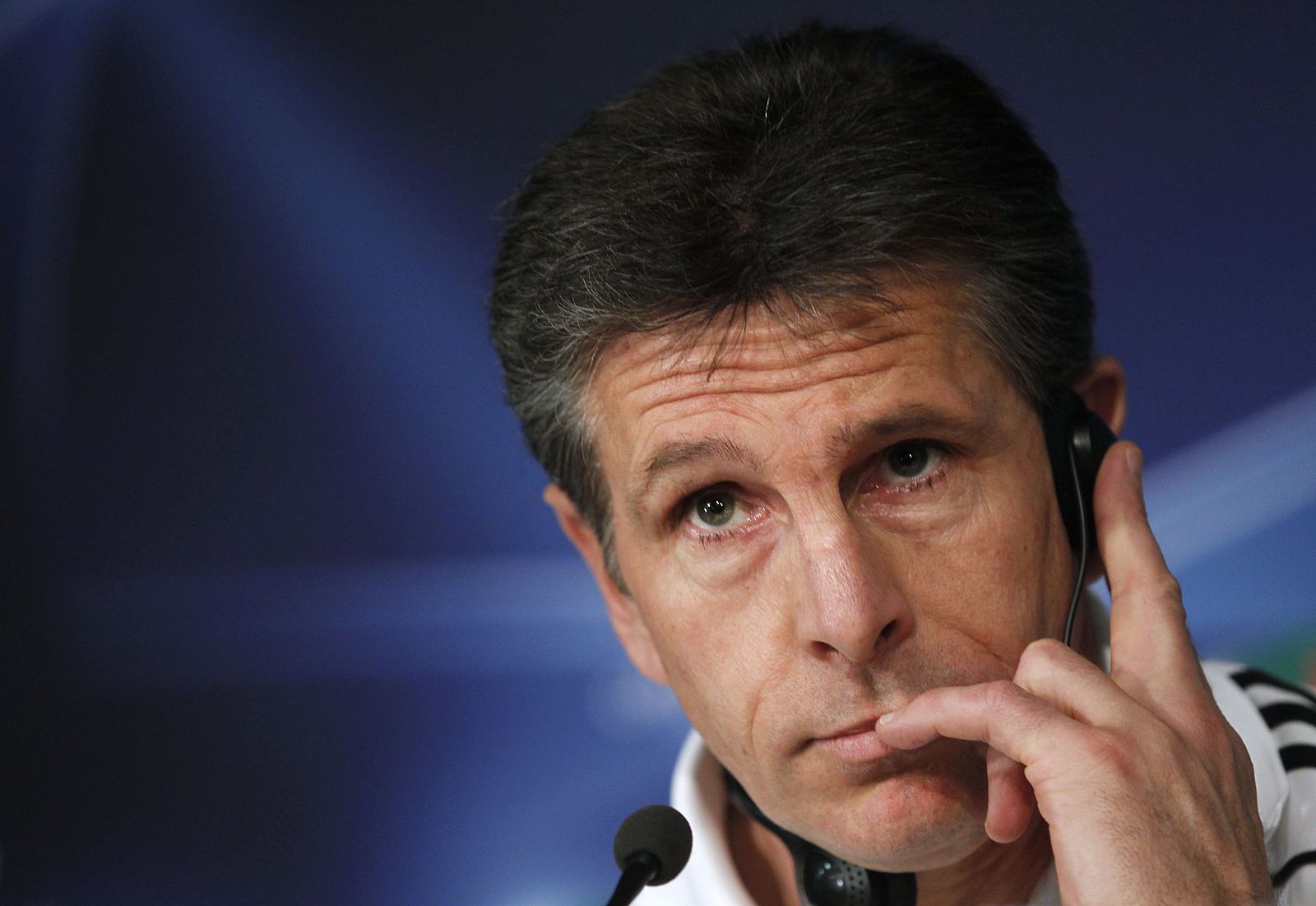 Olympique Lyon's coach Claude Puel attends a news conference at Santiago Bernabeu Stadium in Madrid