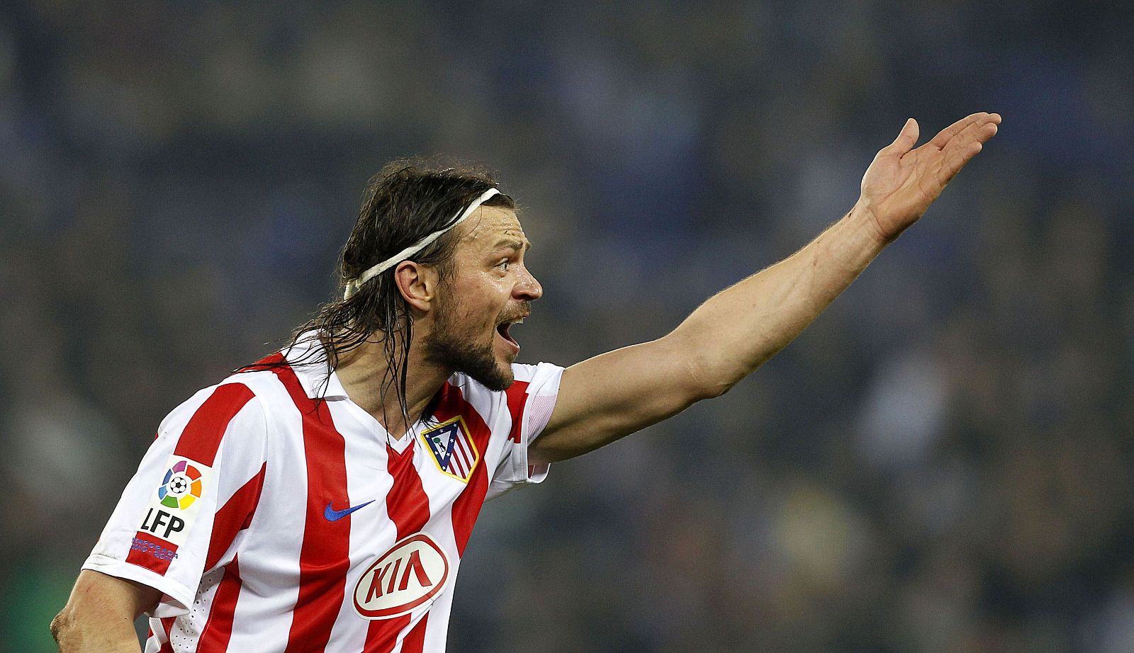 Atletico Madrid's Ujfalusi reacts during their Spanish King's Cup soccer match against Espanyol at Cornella-El Prat stadium near Barcelona