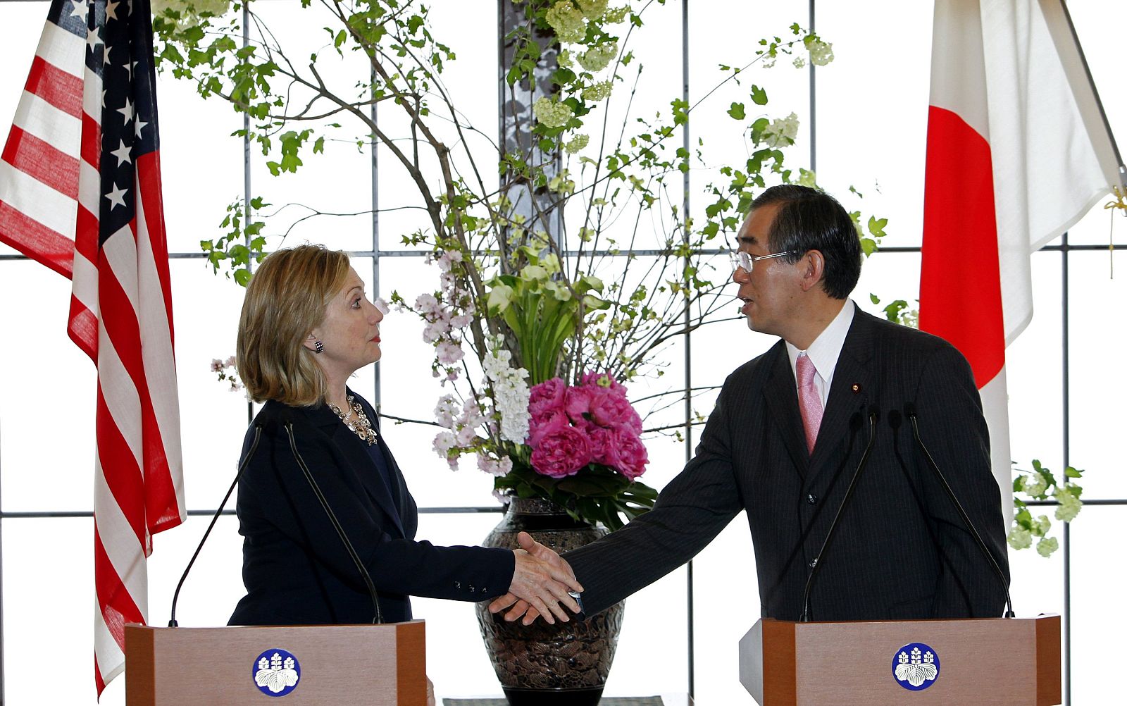 U.S. Secretary of State Clinton and Japan's Foreign Minister Matsumoto shake hands at the end of their joint news conference following meeting in Tokyo