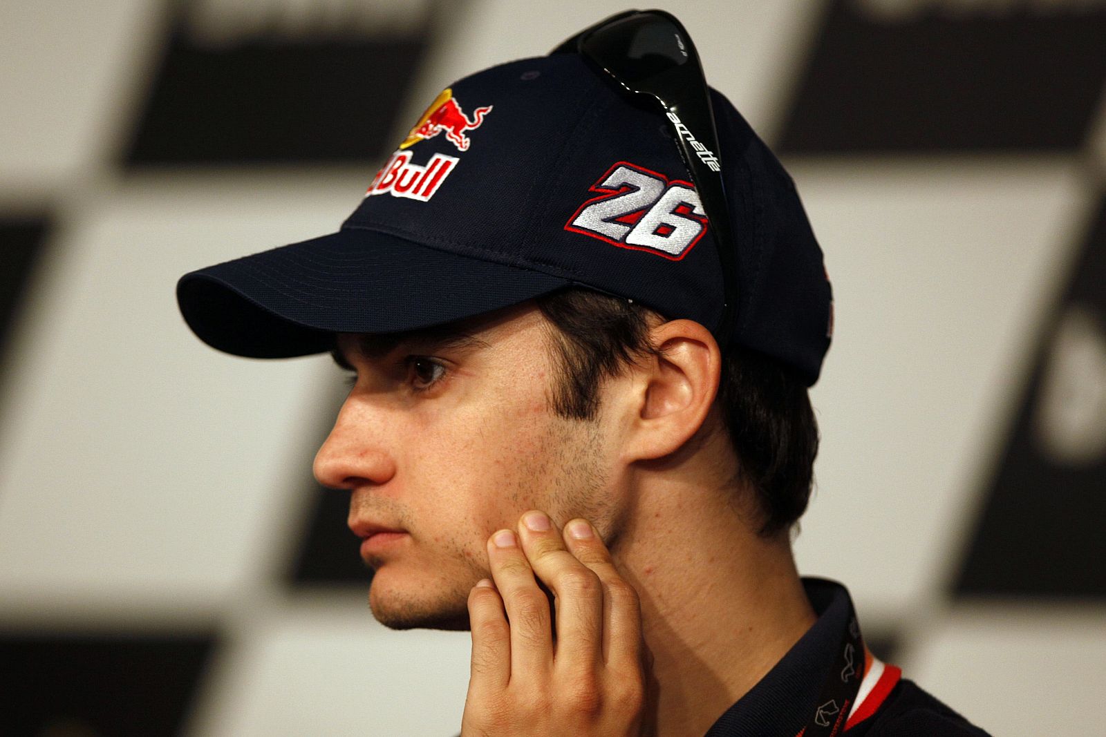 MotoGP rider Honda's Dani Pedrosa of Spain touches his face during a news conference in Jerez