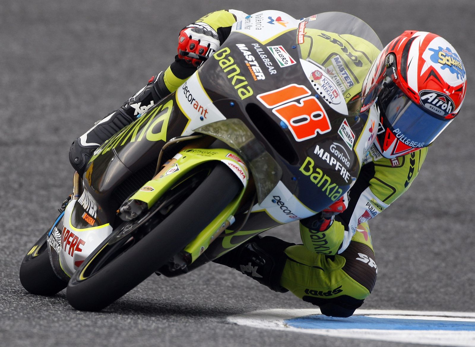 Terol takes a curve on his 125cc Aprilia during the first free practice session for the Portuguese Grand Prix on the Estoril track