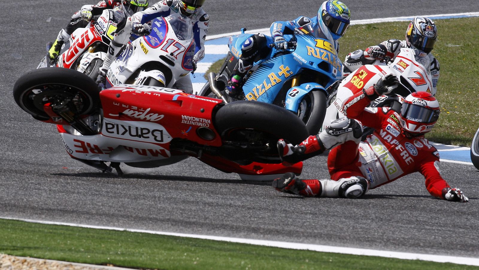 Ducati MotoGP rider Barbera loses control of his motorcycle during the Portuguese Grand Prix in Estoril