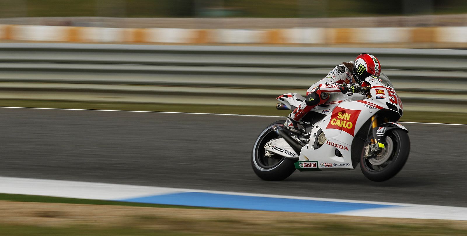 Honda MotoGP rider Marco Simoncelli of Italy rides during the qualifying practice session at the Portuguese Grand Prix in Estoril